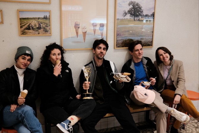 five people eating ice cream