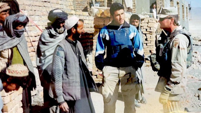 Farid Ferdows ’21 translates for a school reconstruction team in Gardez, Afghanistan in 2003.