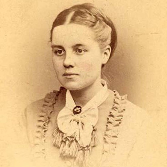 Historic photo from 1873, showing a young woman