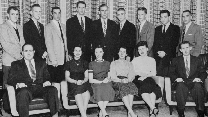 Feeney, bottom right, in a 1956 photo of the Cornell Hotel Association.