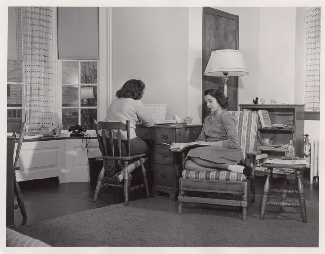Two young women study in the all-female Clara Dickson Hall. 
