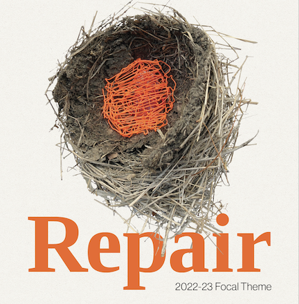 poster featuring an image of a bird's nest filled with orange paint