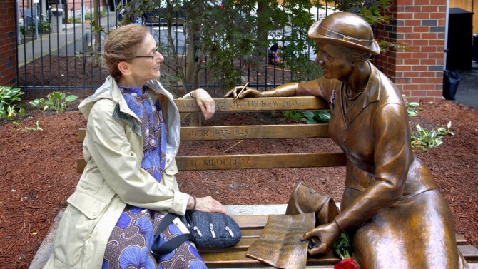 Meredith Bergmann, left, sculpted the likeness of Frances Perkins, whose likeness was unveiled Aug. 17 in downtown Ithaca.