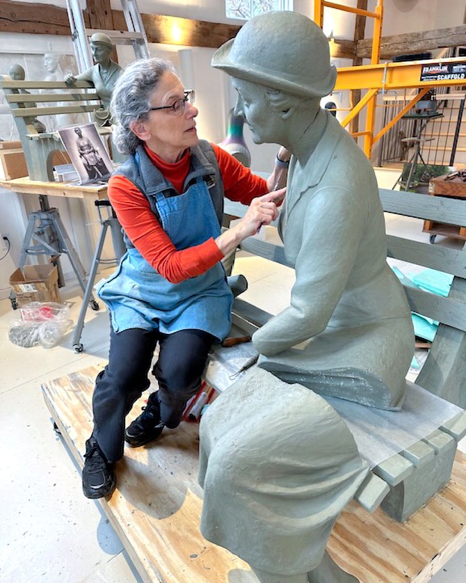 Sculptor works on Frances Perkins statue