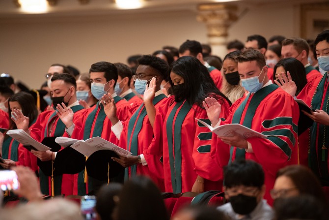 Graduating medical students in the Class of 2022 swear the Hippocratic oath at commencement on May 19.