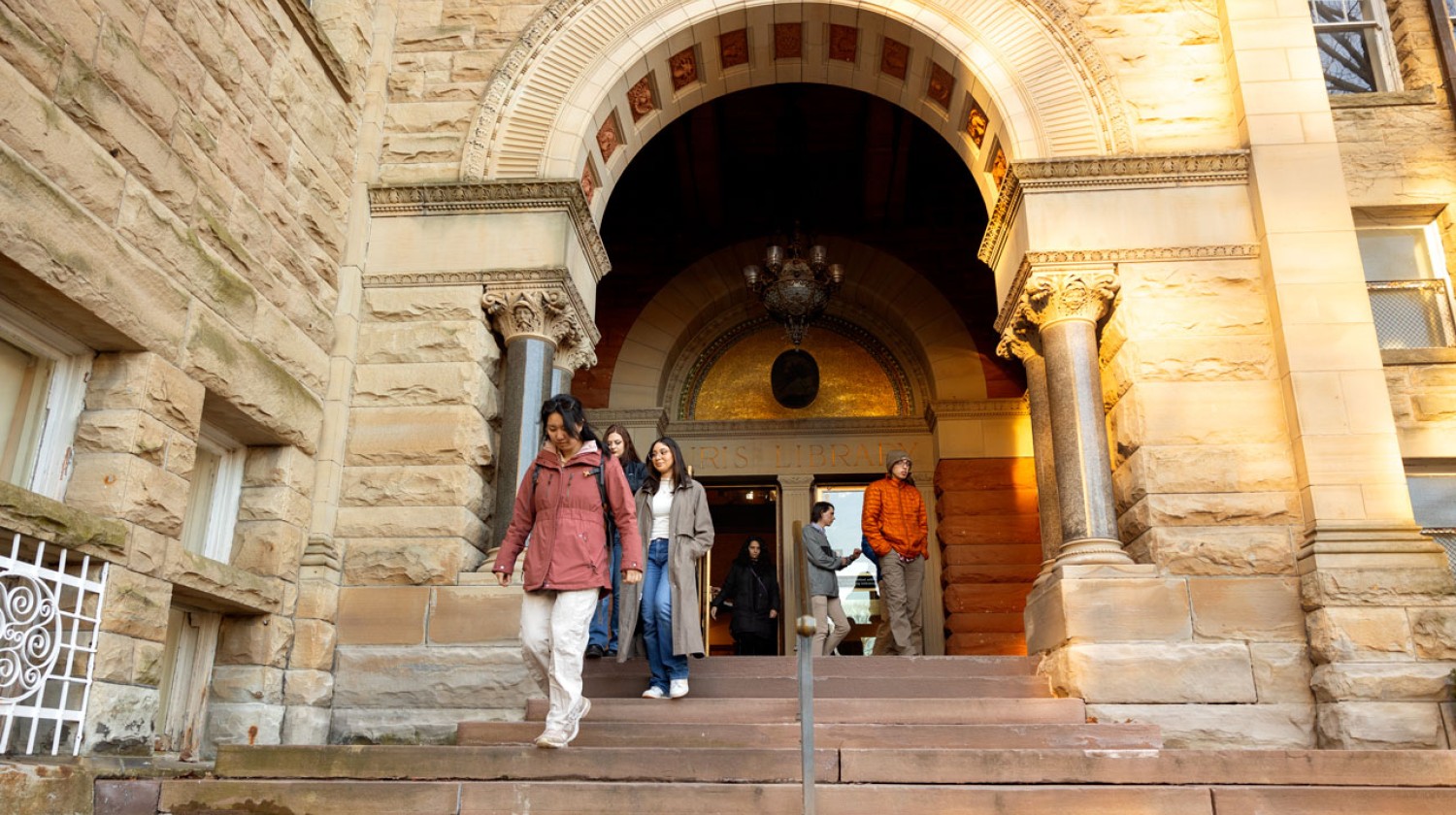 Students traverse the original 1891 steps to Uris Library on March 1