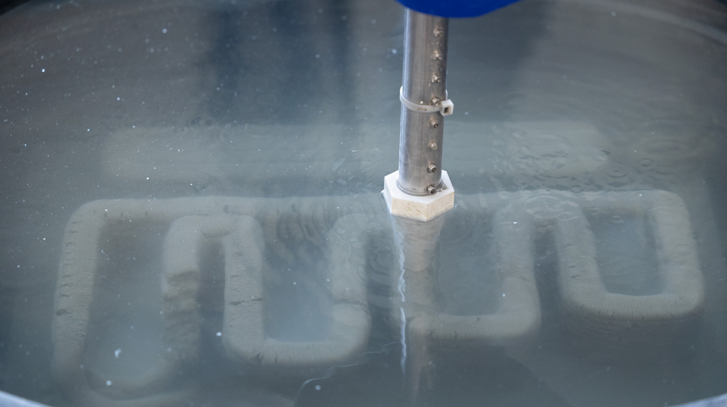 For months, the team has been conducting test prints in a large tub of water, monitoring how the layers are deposited and the strength, shape and texture of each sample.