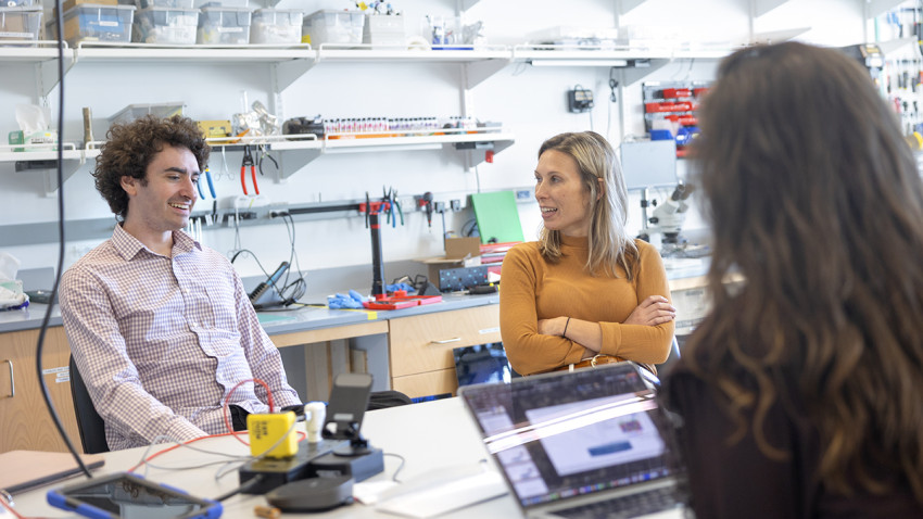 Petro conducts a meeting with her research team, including doctoral candidate Stefan Bell, in Upson Hall.
