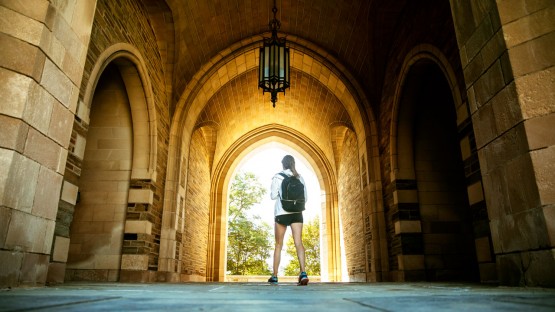 Law students pass through the arches of Myron Taylor Hall.