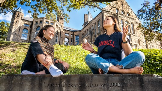 Students enjoy the afternoon sun on Libe Slope.