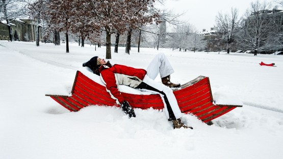 A winter jogger takes a much needed break between intervals on the Arts Quad.
