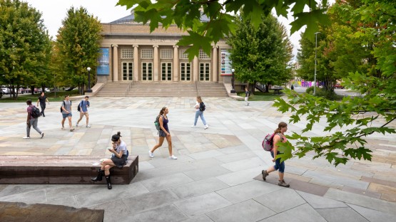 Students cross Bailey Plaza between classes.