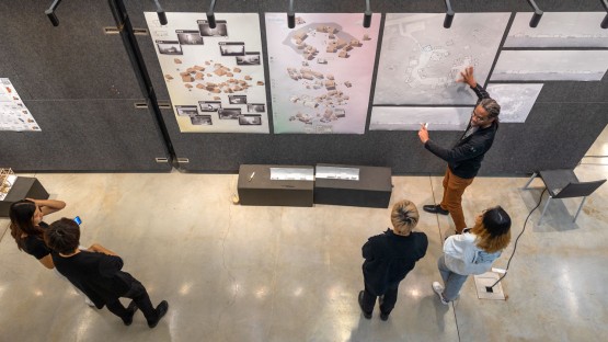 Students in the College of Architecture, Art and Planning go through a critique in Milstein Hall.