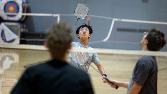 Students get into a game of badminton at Helen Newman Hall.