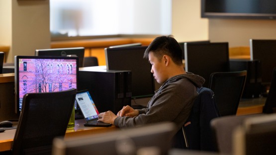 A student works in the Parker Center of Sage Hall before class.