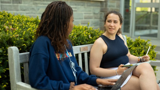 Students work outside of Carpenter Hall.