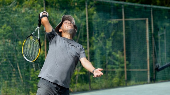 Tennis players enjoy a game at the Cornell Faculty Tennis Club.
