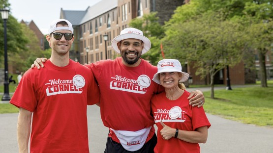 Three move-in volunteers pose for a picture. 