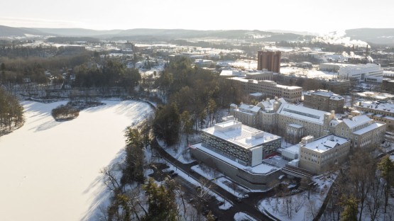 Beebe Lake and Martha Van Rensselar Hall are seen on a snowy morning.