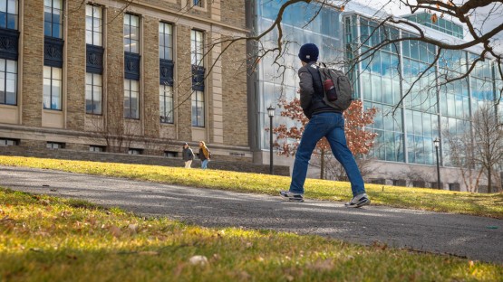 A student heads toward Baker Lab on a warm winter afternoon.