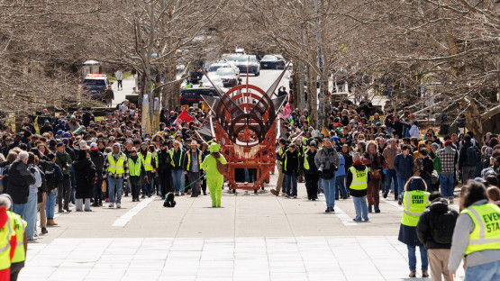 Wide shot of the dragon and parade on Ho Plaza. 