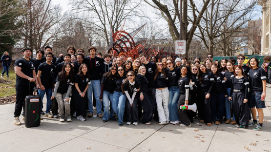 Group photo of the AAP students with the dragon. 