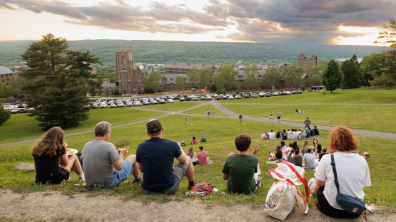Reunion 2026 attendees sit on the Slope