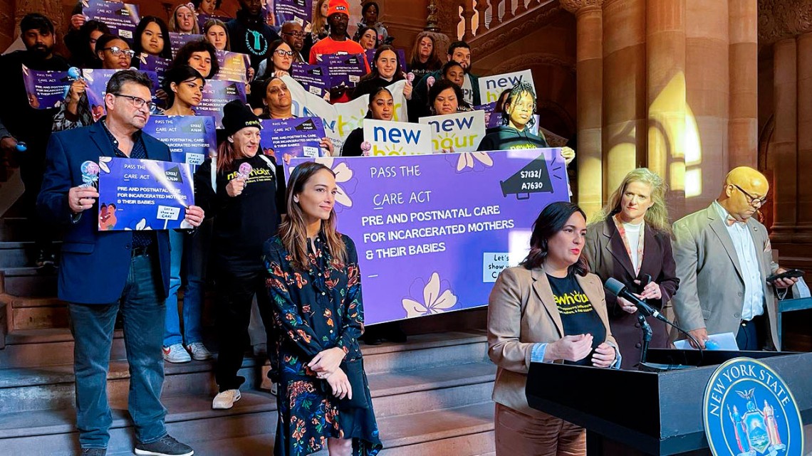 Serena Martin-Liguori speaks to media with supporters of the bill.