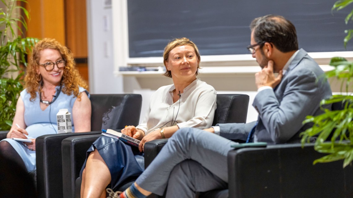 Valzhyna Mort, center, discusses the risks writers take to speak out in many countries, with Suzanne Nossel, left, and David Folkenflik ’91. 