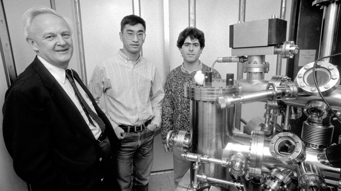 John Silcox, left, is pictured in the lab with graduate students Zhiheng Yu, M.S. ’01, Ph.D. ’04, center, and David Muller, Ph.D. ’96,