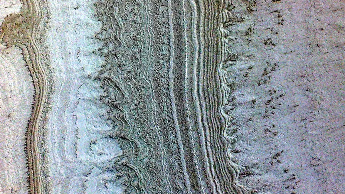 This image taken by NASA’s Mars Reconnaissance Orbiter shows ice sheets at Mars’ south pole.