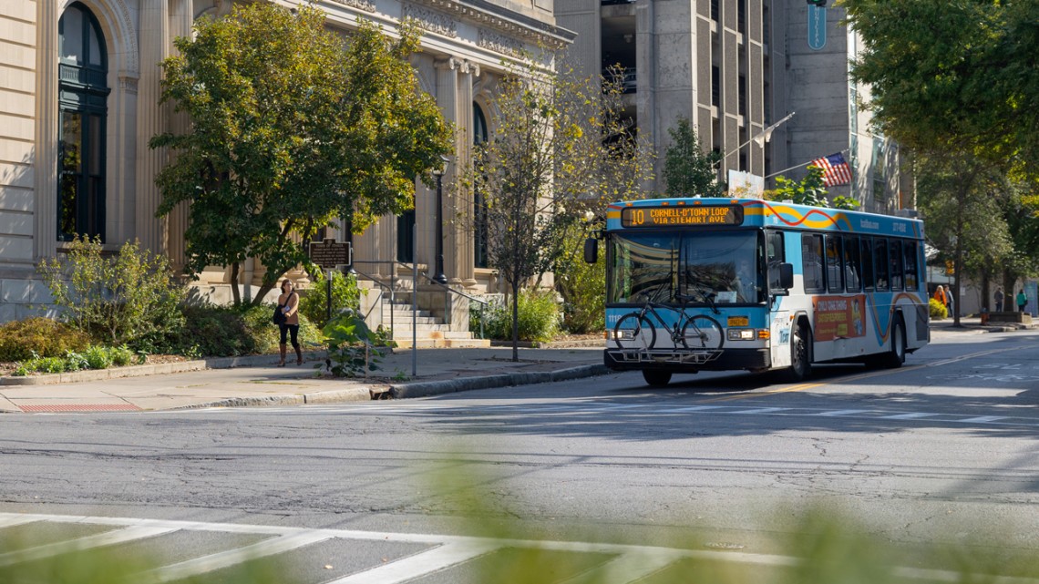 A Tompkins Consolidated Area Transit bus operates in downtown Ithaca.