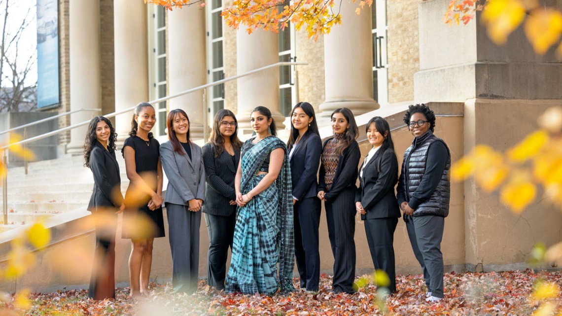 The executive board of Women Leaders of Color, a student group dedicated to uniting and empowering female students of color, outside Kennedy Hall.
