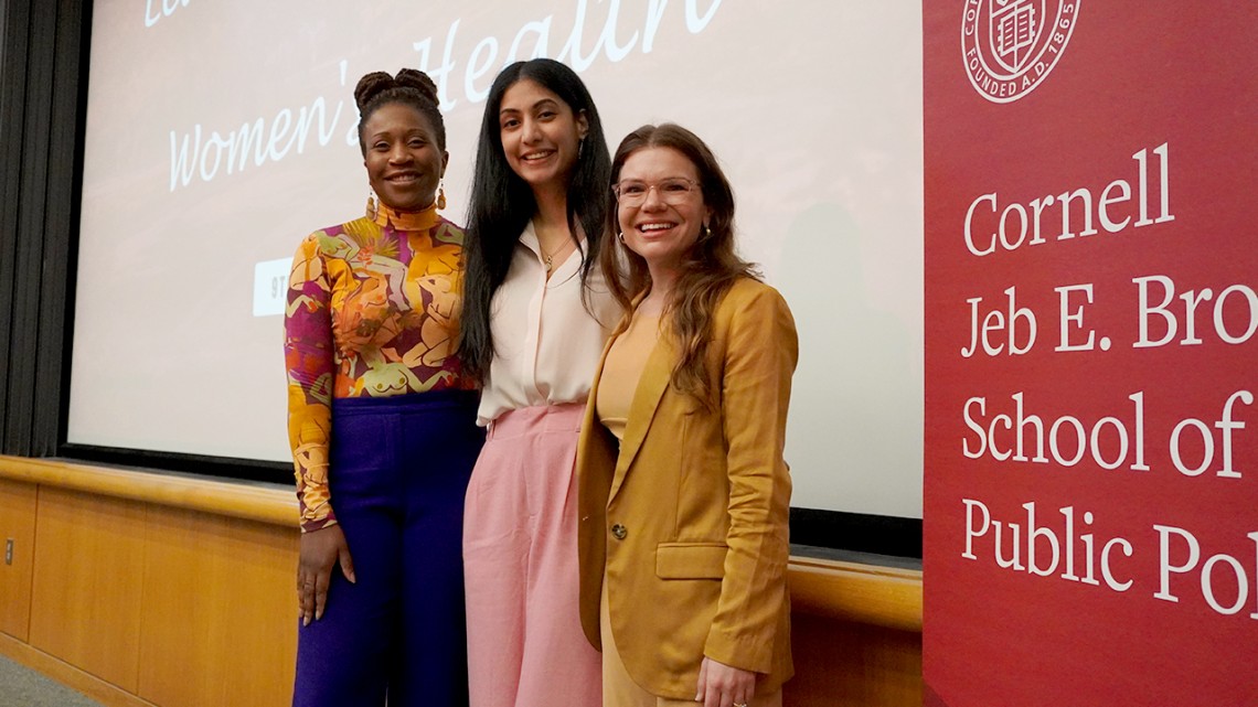 Women in Healthcare Leadership president, Samyukta Singh ’24 (middle), stands with with keynote speakers, Dr. Onyinye Balogun and Eve McDavid, co-founders of Mission-Driven Tech in front of a Brooks School Banner
