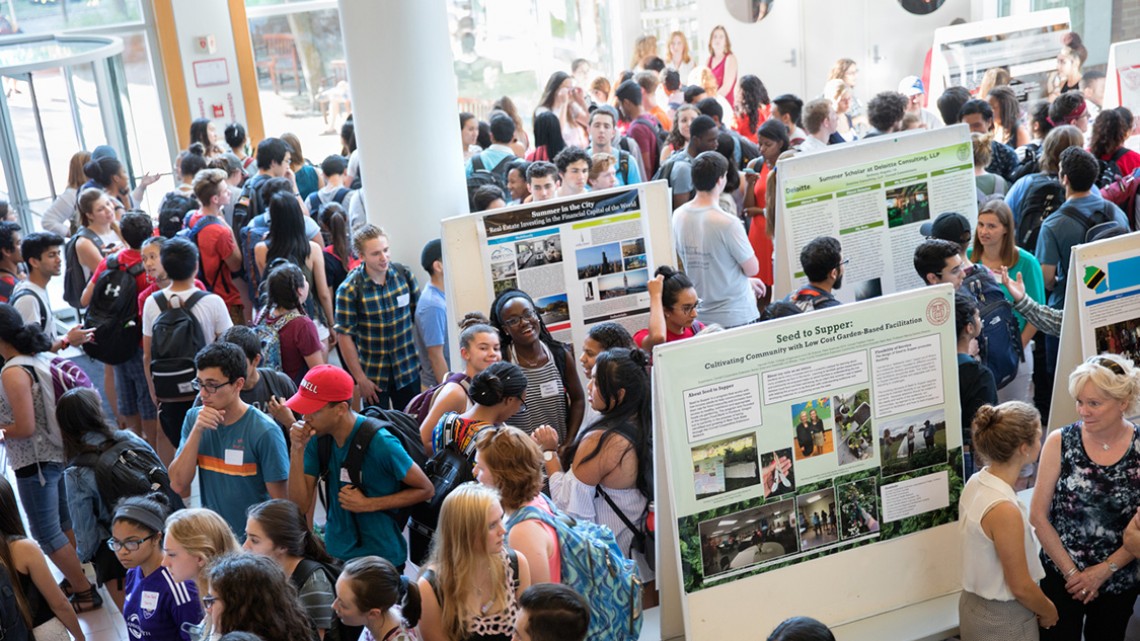 Several hundred students gathered at the Cornell Commitment event Sept. 27 to view posters and hear panel discussions on how student scholars spent their summer.