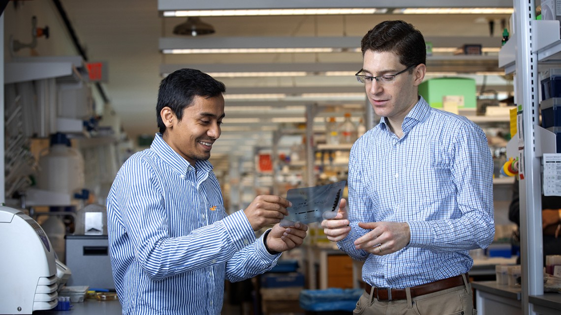 Adnan Shami Shah (left) and Jeremy Baskin in the lab