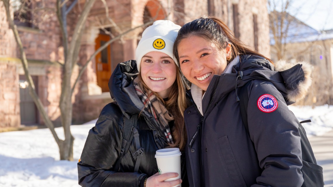 Two women students outside during Cornell's Winter Session 