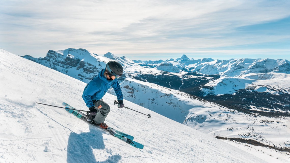 Skier on tall mountain