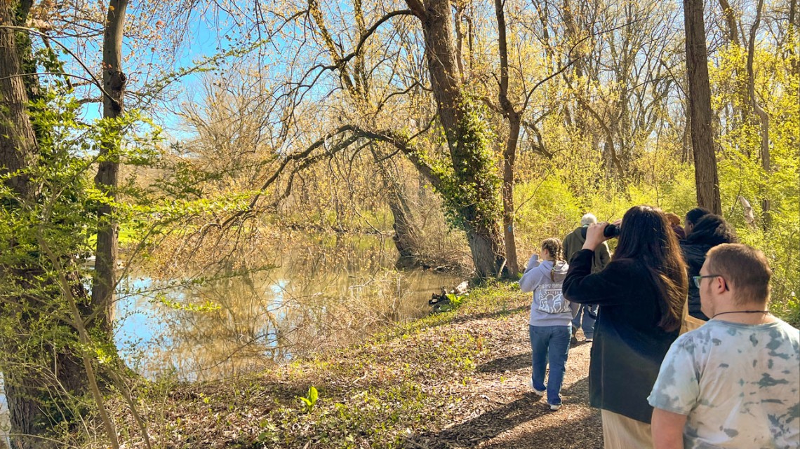 “Birding buddies” go on a birding walk through Stewart Park at the end of the spring semester.