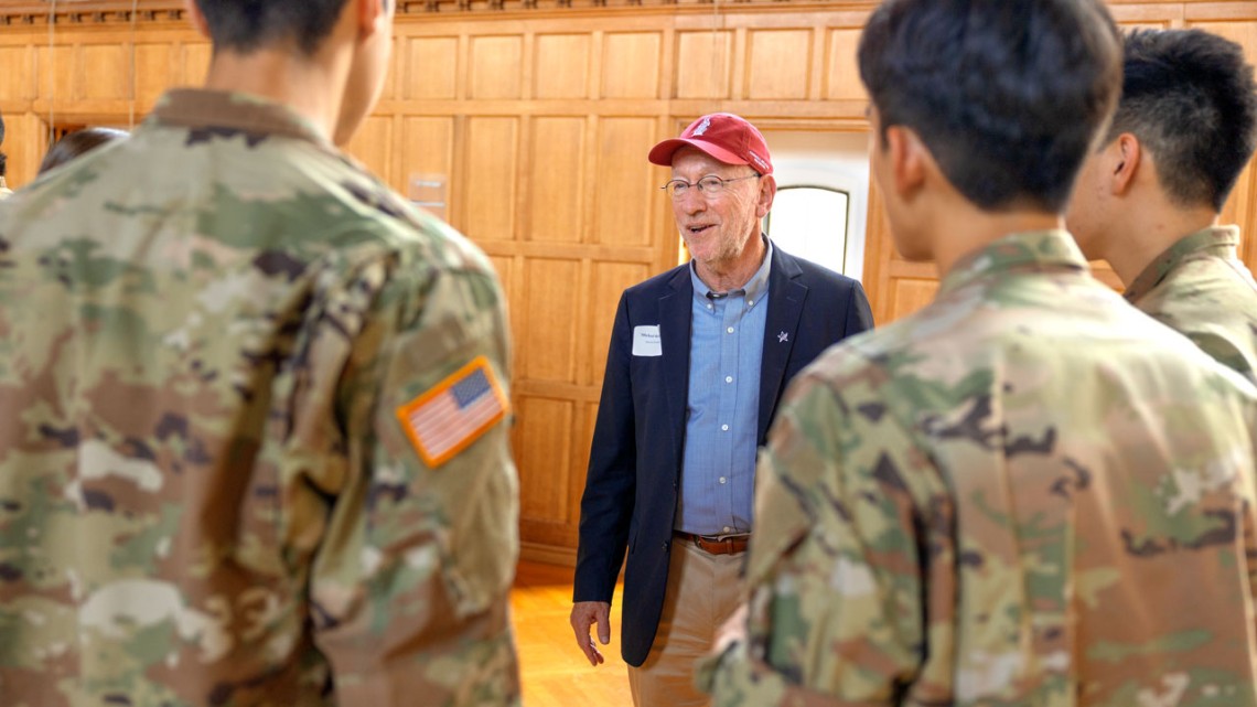 Interim President Michael Kotlikoff speaks with members of Cornell’s military community during an event welcoming them to Cornell at Willard Straight Hall Memorial Room.