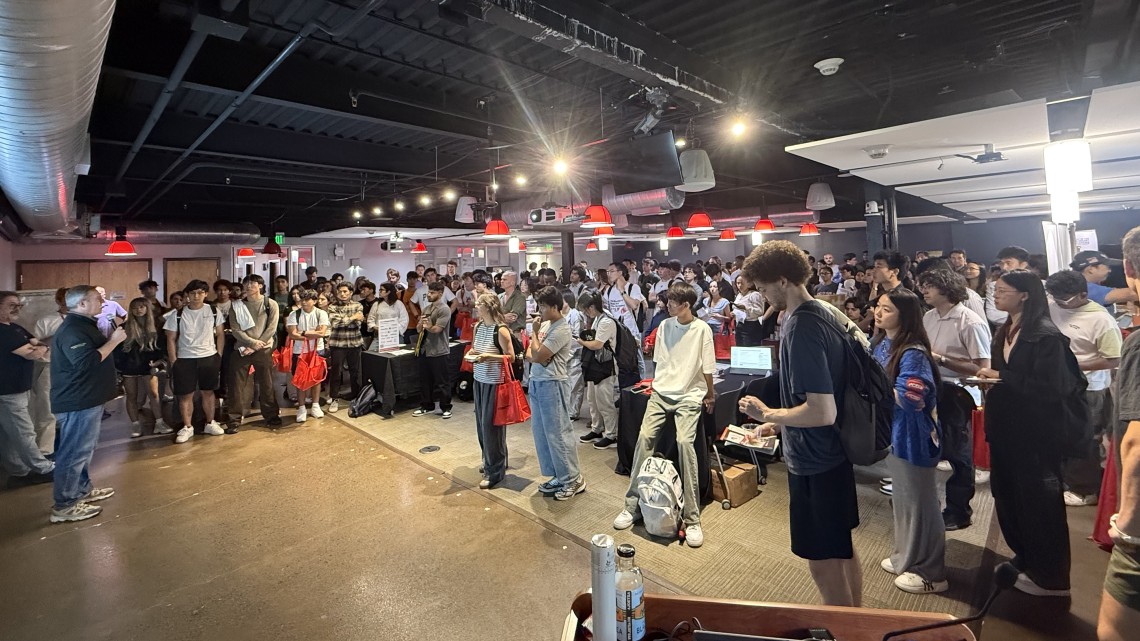 a crowd of people in a room