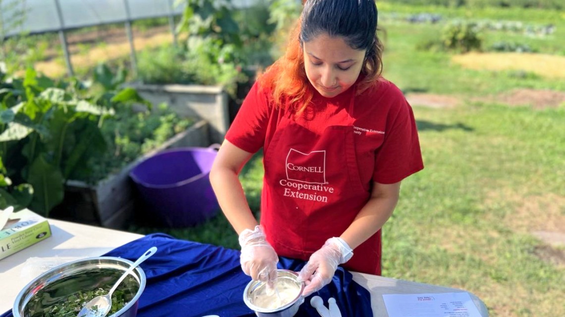Subidha Neupane, former nutrition educator for Cornell Cooperative Extension Sullivan County, teaches a demo for Sullivan Fresh, a program funded by SNAP-Ed New York that helps increase access to fresh fruits and vegetables for food-insecure residents.