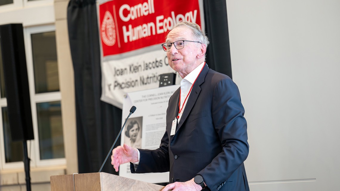 Irwin Jacobs ’54, BEE ’56, speaks at the dedication of the Cornell Joan Klein Jacobs Center for Precision Nutrition and Health, with many of his family members in attendance. 