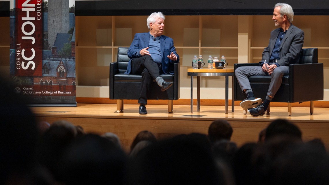 Nobel Prize-winning economist and former Cornell professor Richard Thaler, left, speaks on stage with Thomas Gilovich, the Irene Becker Rosenfeld Professor of Psychology, in the Statler Auditorium.