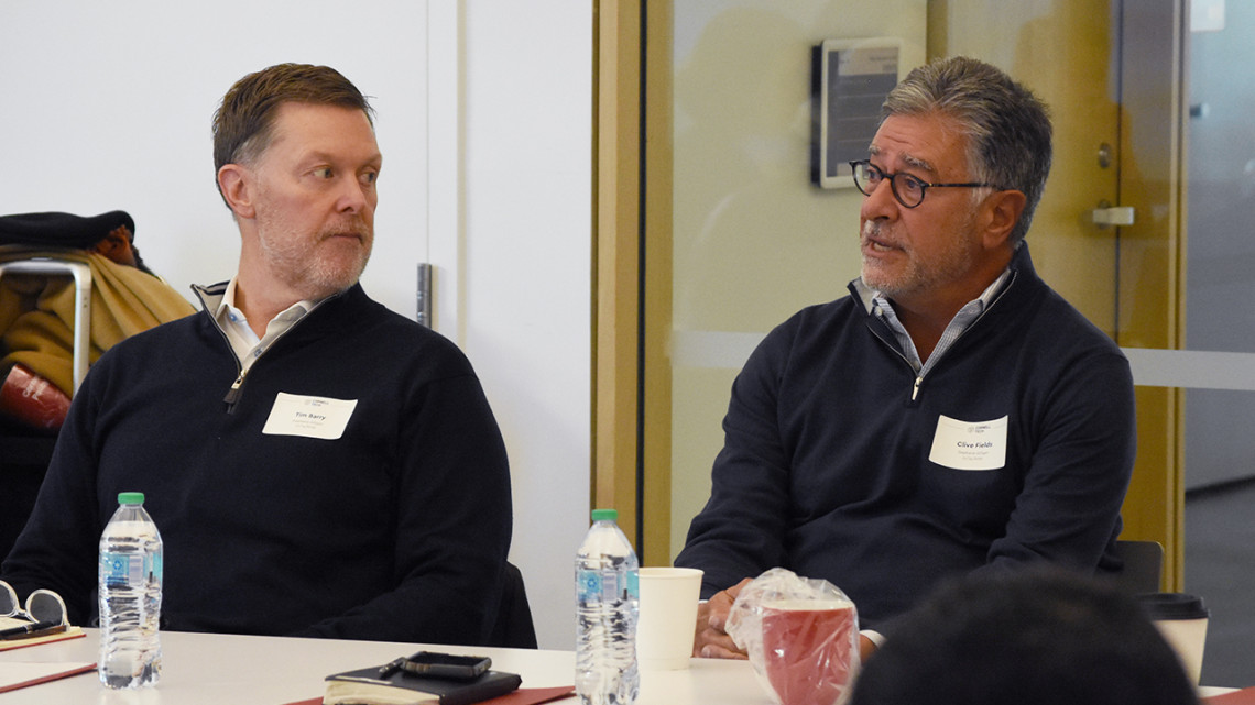Tim Barry and Clive Fields (left to right) sitting at a conference table