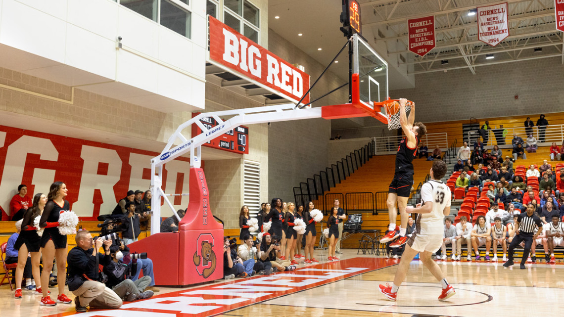 Jake Fiegen ’26 dunks against Brown on Feb. 28. Fiegen and the Big Red secured a spot in the Ivy League Tournament, which will be held at Newman Arena March 13-15.