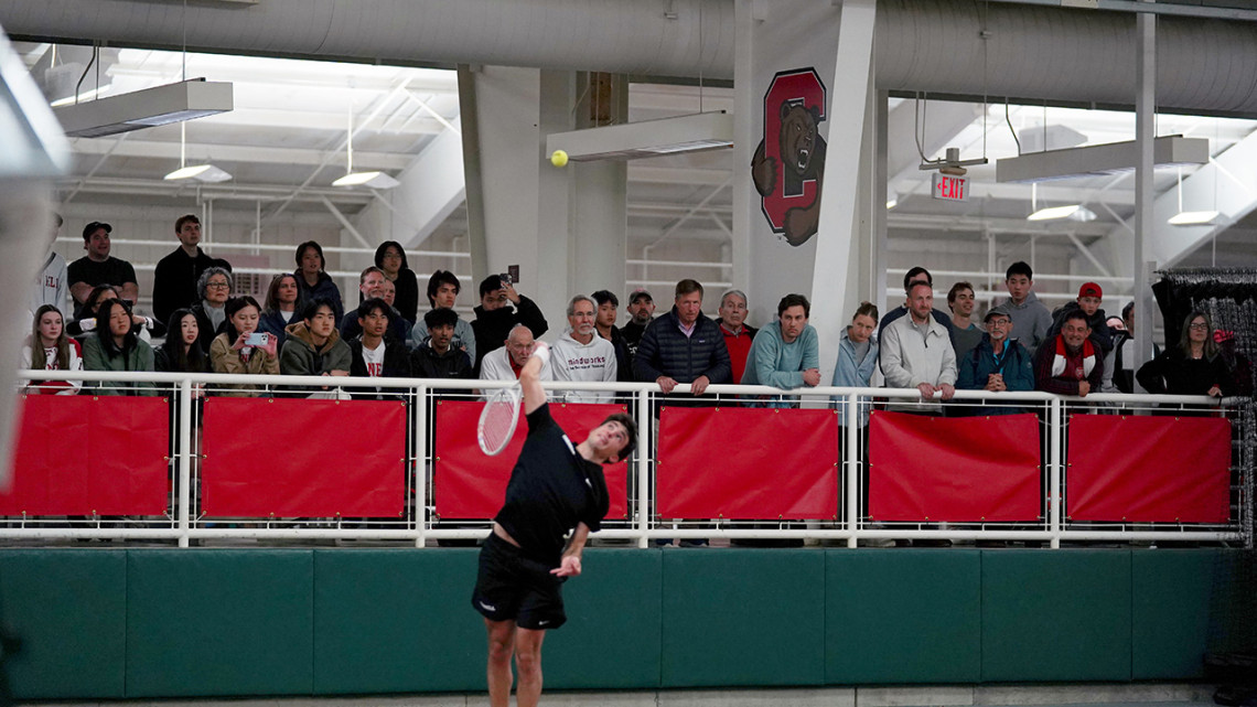 Rodrigo Fernandes ’28 serves to Columbia’s Michael Zheng during the decisive singles match in the Big Red’s 4-3 victory April 25 at Reis Tennis Center in Ithaca. 