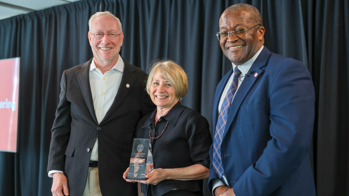 Beckie Robertson ’82 with Cornell President Michael Kotlikoff (left) and Duffield Engineering Dean Lynden Archer, who presented her with the Cornell Duffield Engineering Distinguished Alumni Award, April 23 in Upson Hall.
