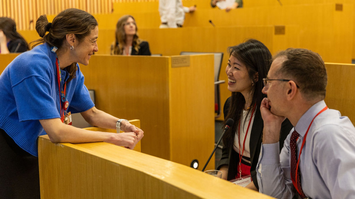 Conference participants chatting