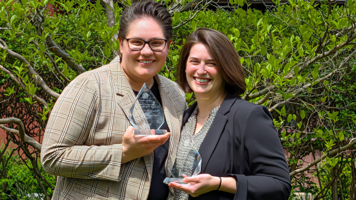 Maegan Puzas Kessen (left), assistant director of inclusive academic advising in the College of Agriculture and Life Sciences Office of Academic Programs, won the Leadership and Community Impact Award and Alex Pizzola, assistant director of engineering advising in the Cornell Duffield College of Engineering, won the Individual Impact Award at a presentation May 7.